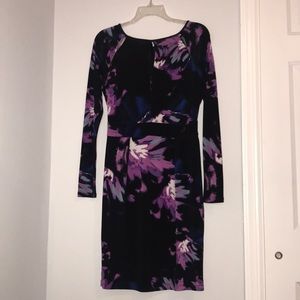 BEAUTIFUL black fitted JLO dress .